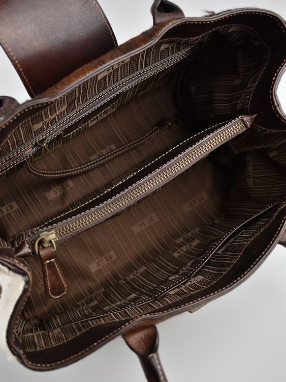 07 14 Schultertasche mit Fell