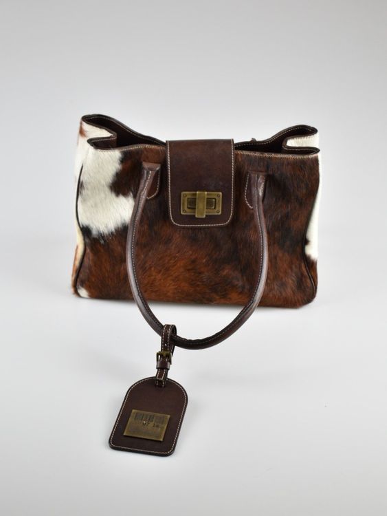 07 14 Schultertasche mit Fell