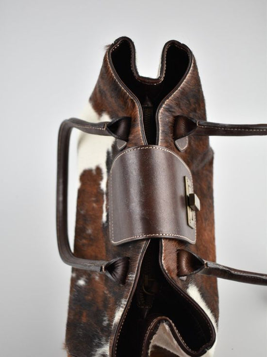 07 14 Schultertasche mit Fell
